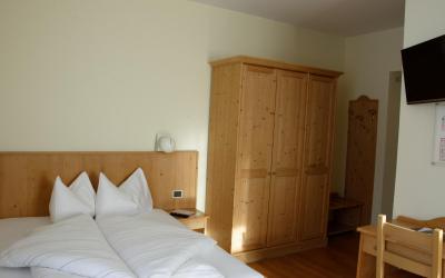 Camera Quadrupla Superior