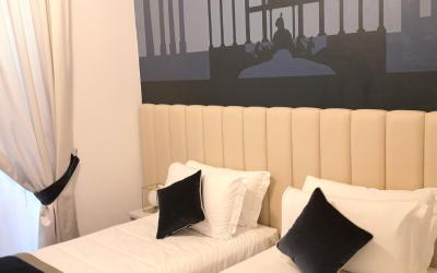 Camera Deluxe Doppia con Letti Singoli