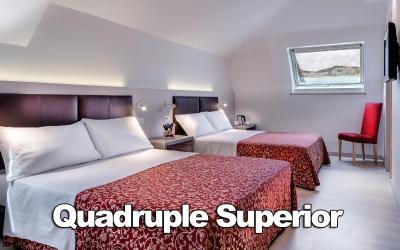 Camera Quadrupla Superior