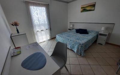 Camera Tripla con Vista Giardino