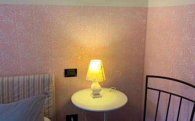 Camera Familiare con Vista Giardino