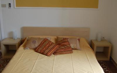 Camera Matrimoniale con Bagno in Comune 