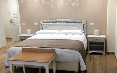 Camera Quadrupla Superior