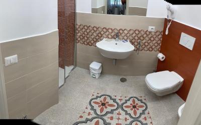 Camera Tripla con Vista Giardino