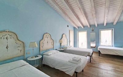 Camera Quadrupla Superior