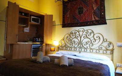 Camera Quadrupla Economy