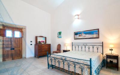 Camera Quadrupla con Vista Giardino 