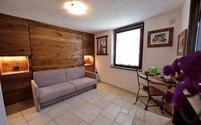 Camera Quadrupla con Vista Montagna 