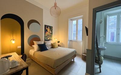 Camera Quadrupla Superior