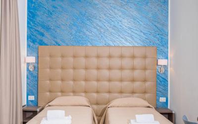 Camera Deluxe Doppia con Letti Singoli