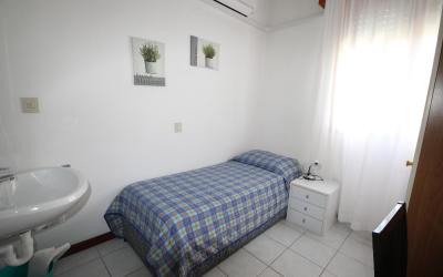 Due Camere Comunicanti con Letti Singoli