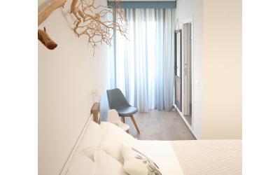 Camera Quadrupla Superior