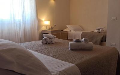 Camera Tripla Superior