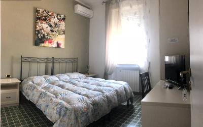 Camera Quadrupla Superior