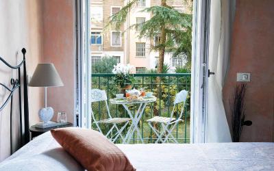 Camera Matrimoniale/Doppia con Letti Singoli con Balcone e Vista Giardino