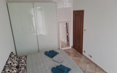 Camera Matrimoniale con Bagno in Comune 