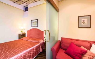 Camera Quadrupla Superior