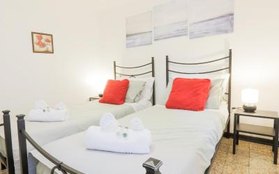 Camera Matrimoniale/Doppia con Letti Singoli con Bagno in Comune