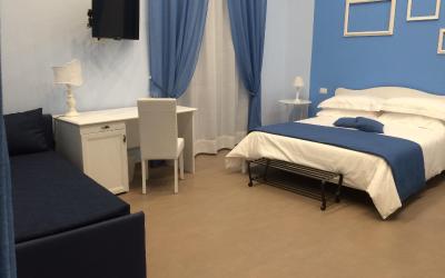 Camera Quadrupla Superior