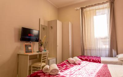 Camera Tripla Superior