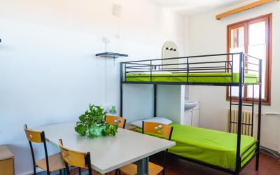 Posto Letto in Dormitorio Misto con Bagno in Comune 