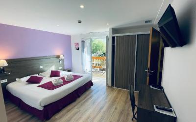 Chambre Lit Queen-Size avec Balcon Chambre Lit Queen-Size avec Balcon