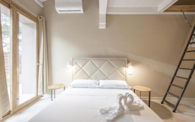 Camera Familiare con Vista Giardino