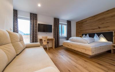 Camera Quadrupla Superior