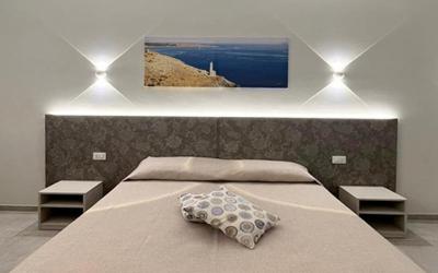 Camera Quadrupla Superior