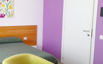 Camera Deluxe (2 Adulti + 1 Bambino)