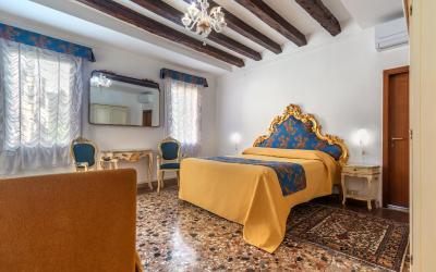 Camera Familiare con Vista Giardino