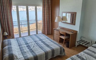 Camera Tripla con Vista Lago