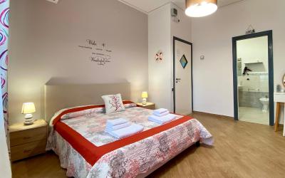 Camera Matrimoniale con Balcone (2 Adulti + 1 Bambino)