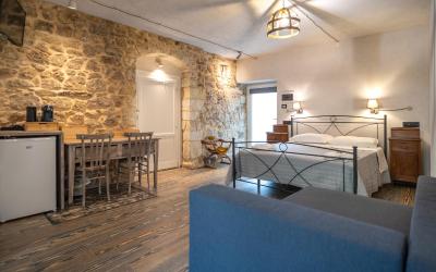 Camera Tripla con Vista Giardino