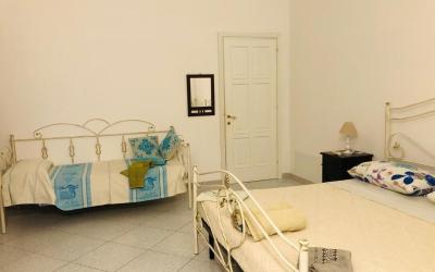 Camera Quadrupla con Bagno in Comune 