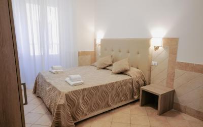 Camera Matrimoniale/Doppia con Letti Singoli con Bagno