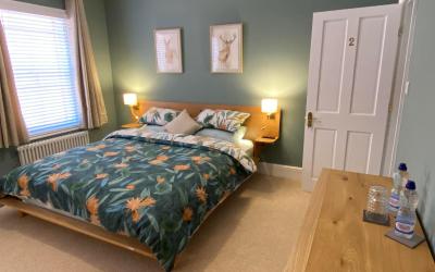 Queen Room with Shared Bathroom