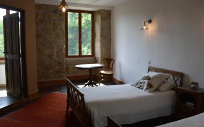 Chambre Lits Jumeaux - Vue sur Jardin Chambre Lits Jumeaux - Vue sur Jardin