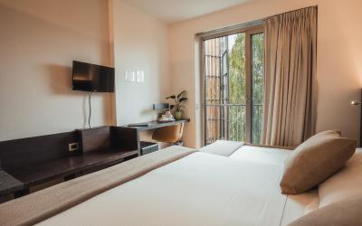 Camera Tripla con Vista Giardino