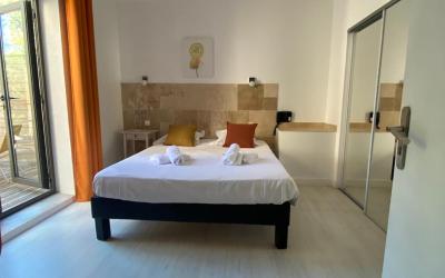 Chambre Quadruple avec Terrasse (2u00a0Chambres Su00e9paru00e9es) 