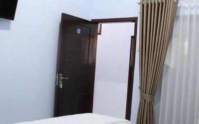 Kamar Double dengan Kamar Mandi Pribadi Kamar Double dengan Kamar Mandi Pribadi