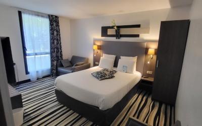 Chambre Supu00e9rieure 1u00a0Lit Double et 1u00a0Lit Simple Chambre Supu00e9rieure 1u00a0Lit Double et 1u00a0Lit Simple