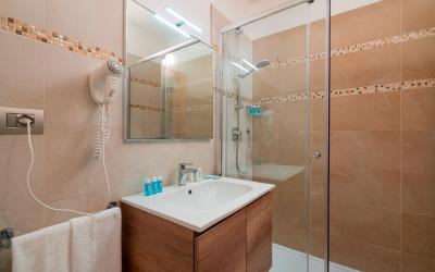 Camera Familiare con Vista Giardino