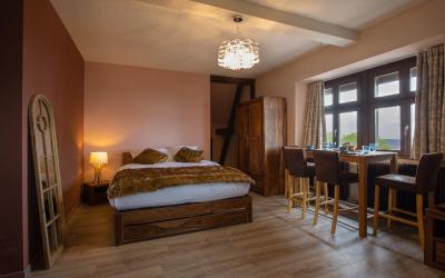 Chambre Deluxe (2 Adultes + 1 Enfant) Chambre Deluxe (2 Adultes + 1 Enfant)