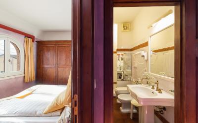 Camera Familiare con Vista Giardino