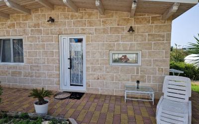 Camera Familiare con Vista Giardino