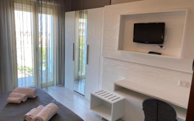 Camera Quadrupla Superior