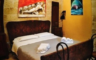 Camera Tripla Superior con Patio 