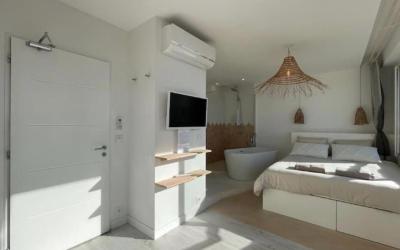 Suite Lit King-Size avec Balcon Suite Lit King-Size avec Balcon