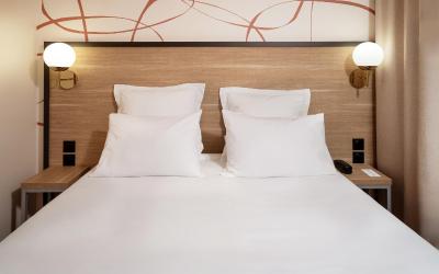 Chambre Lit Queen-Size Exu00e9cutive avec Canapu00e9-Lit - Non-Fumeurs Chambre Lit Queen-Size Exu00e9cutive avec Canapu00e9-Lit - Non-Fumeurs